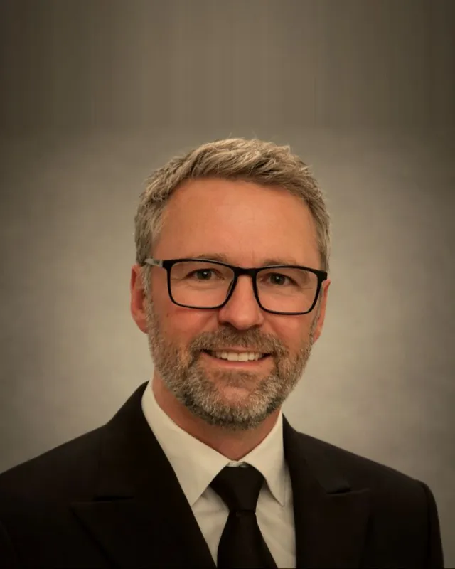 Portrait of Trevor Loader, Director of Systems Strategy and Architecture.